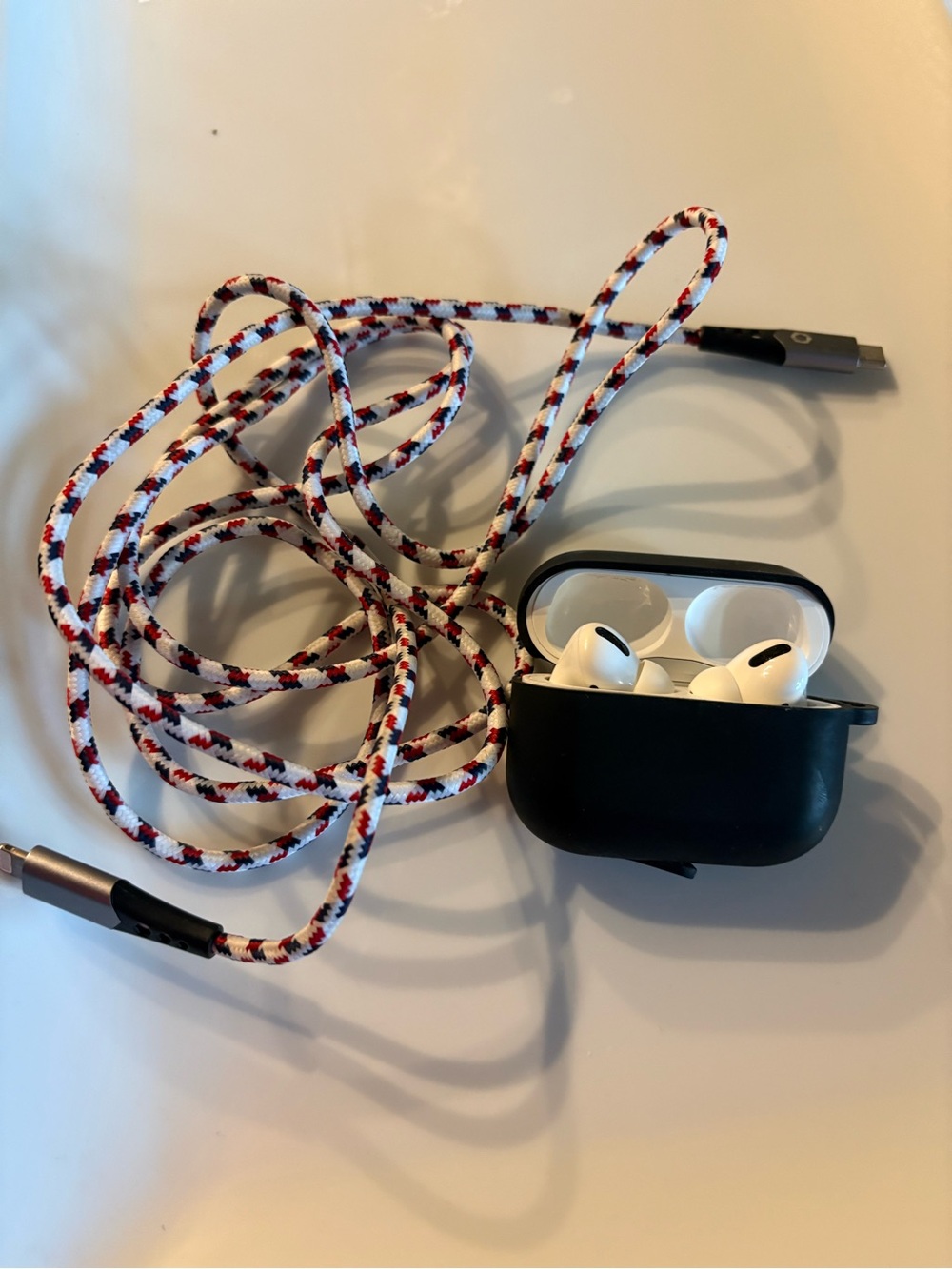 Apple AirPods Pro (1st Gen) with Black Case & lightening charging cable